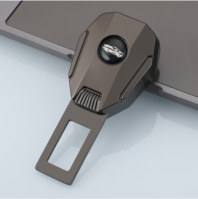 Black car seat belt extender, a stylish auto accessory with a sleek design. It features a car logo emblem and is crafted to enhance seat belt convenience and safety in vehicles, adding a touch of elegance to the car's interior.