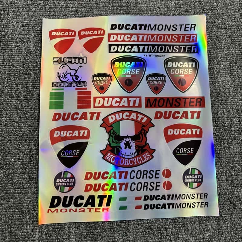 Laser sticker sheet with multiple Ducati Monster and Ducati Corse logos, along with a skull design, ideal for customizing Ducati motorcycles to showcase a bold and racing - inspired style.
