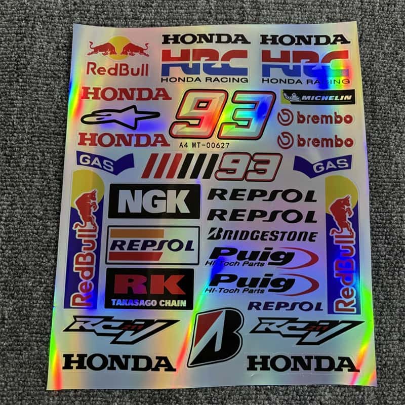 Laser sticker sheet with multiple Suzuki logos, Monster Energy branding, and Akrapovic designs, ideal for customizing Suzuki motorcycles to showcase a racing - inspired style.